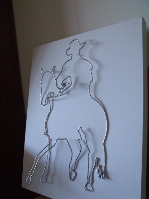 3D wire scuplture horse and rider on canvas