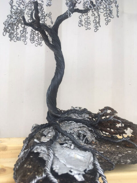 Live Wire Sculptures new Blackened Wire Trees on the base of black pumice stone & molten metal left from the South Coast Fires