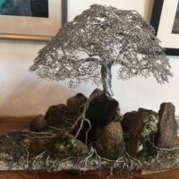 “The Talisman Tree” recycled mossy granite rock and wire sculpture