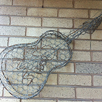 “The Tin Mans Guitar” Recycled Barbed Wire Sculpture