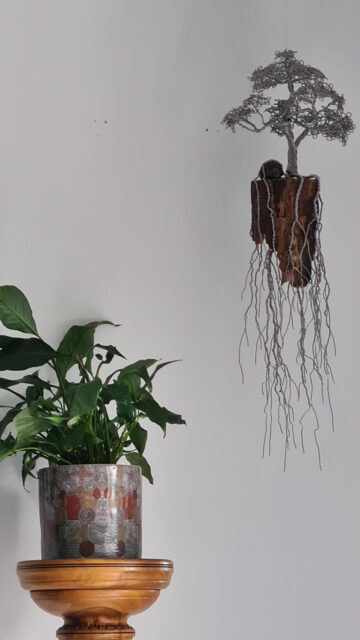 Suspended "Mentor" recycled wood and banksia seed cone tucked inside, with armature wire Tree Sculpture 'Laputa' floating island inspired with hanging Roots from Live Wire Sculptor, Alan Holley