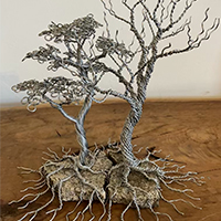 “Yin Yang Embrace” Split Recycled Granite and Wire Tree Sculptures